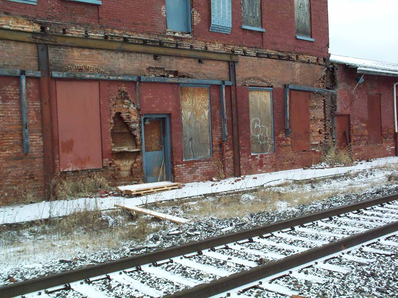 Hornell Erie Depot before restoration with boarded up windows and crumbling brick walls