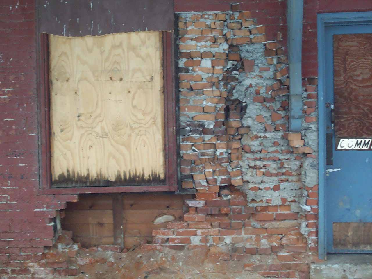 Hornell Erie Depot before restoration with boarded up windows and crumbling brick walls