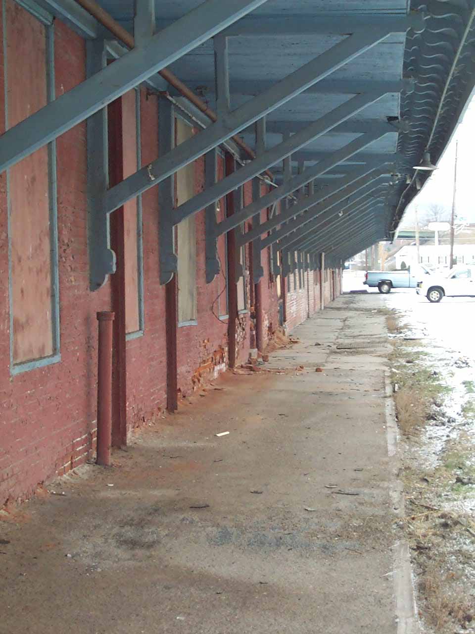 Hornell Erie Depot before restoration with boarded up windows and crumbling brick walls