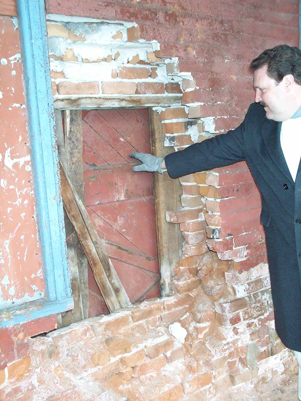 Hornell Erie Depot before restoration with boarded up windows and crumbling brick walls